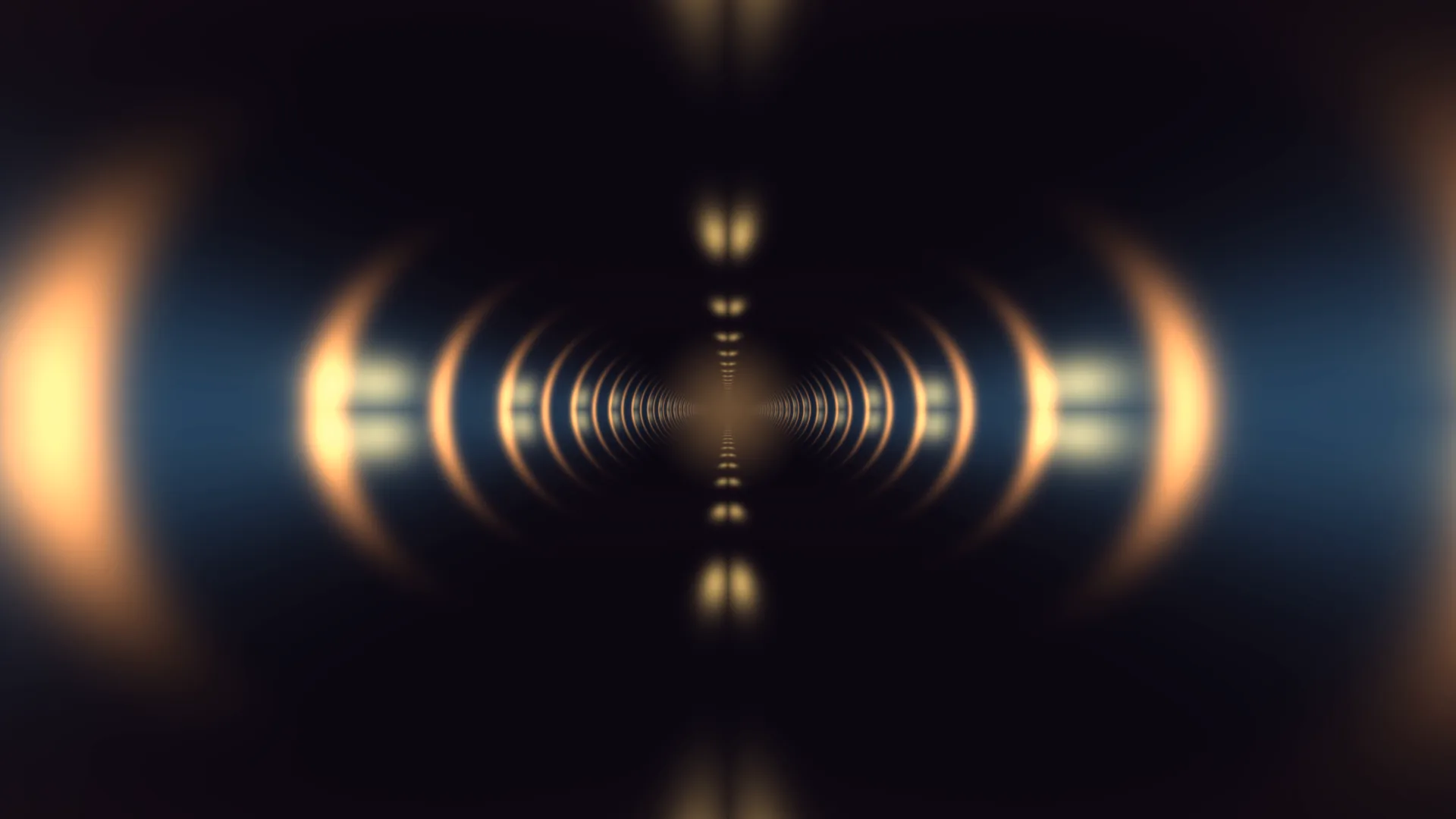 Amber rings in a dark symmetrical tunnel — concentric rings wallpaper at 3840x2160