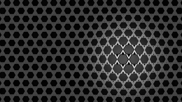 Charcoal hexagon lattice with a central glow — hexagon wallpaper at 3840x2160
