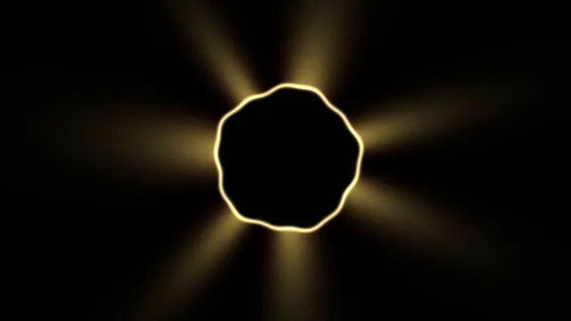 Golden ring and radial light on black — golden ring wallpaper at 3840x2160