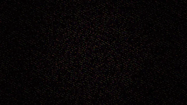 Mosaic of dim colour across a black field — abstract wallpaper at 3840x2160