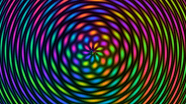 Chromatic rings around a luminous central spiral — concentric rings wallpaper at 3840x2160