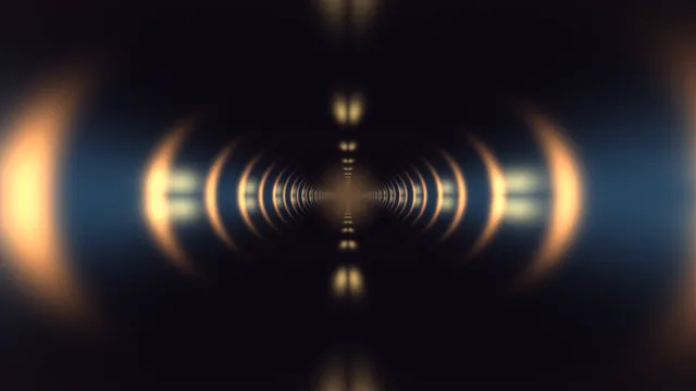 Amber rings in a dark symmetrical tunnel — concentric rings wallpaper at 3840x2160